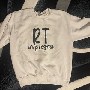 White Sweatshirt with Black 'RT in Progress' Print